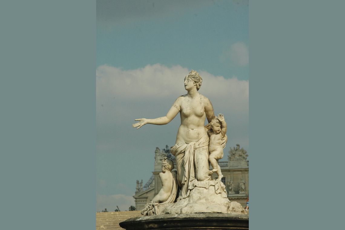 Statue of Leto Apollo and Artemis Under Blue Sky Credits CARLOSCRUZ ARTEGRAFIA Canva